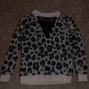 I am selling a leopard print v-neck sweat shirt